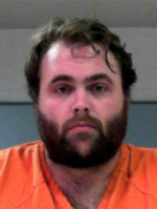 FILE - This booking photo provided by the North Central Regional Jail and Correctional Facility in W. Va. shows Chester Lilly, who is accused of murdering his neighbor in June 2019.