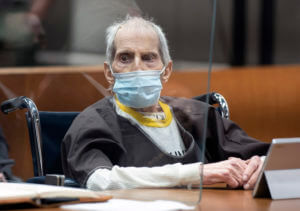 Robert Durst sits in court with a mask on