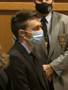 Chandler Halderson sits in court