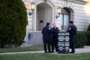 Officers stand outside of the Carroll County Courthouse