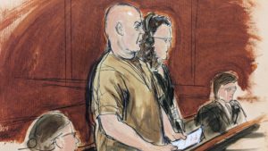 In this courtroom sketch, defendant Lawrence Ray, left, makes a statement during his sentencing in Manhattan federal court, Friday, Jan. 20, 2023 in New York