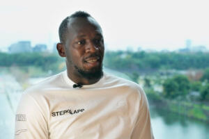 Retired Jamaican sprinter Usain Bolt speaks during an interview in Tokyo, Thursday, Dec. 1, 2022
