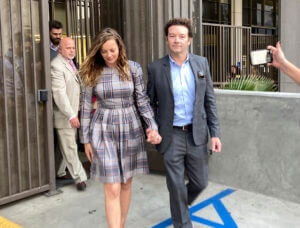 Actor Danny Masterson leaves Los Angeles superior Court with his wife Bijou Phillips after a judge declared a mistrial in his rape case
