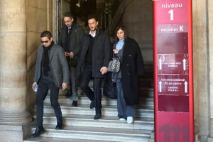 Moroccan singer Saad Lamjarred, second right, leaves the court house