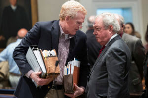 Alex Murdaugh speaks with his attorney Dick Harpootlian during his double murder trial at the Colleton County Courthouse on Wednesday, Feb. 8, 2023