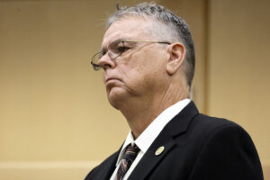 Former Marjory Stoneman Douglas High School School Resource Officer Scot Peterson stands in court.