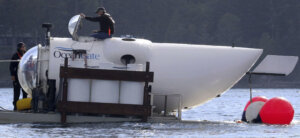 Stockton Rush emerges from the hatch atop the OceanGate submarine Cyclops 1