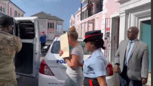 lindsay shiver escorted by police