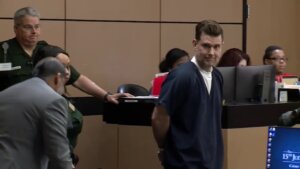 Tim Ferriter appears in handcuffs