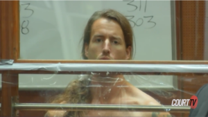 Sam Haskell appears shirtless at an arraignment