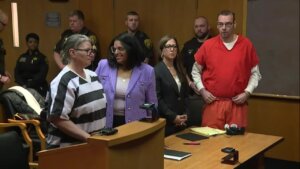 Jennifer and James Crumbley in court with their attorneys