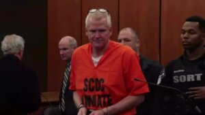Alex Murdaugh in jumpsuit, cuffs