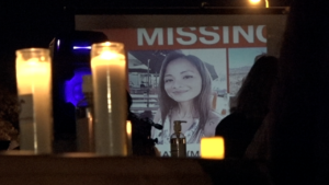 Photo of Maya Millete with candles