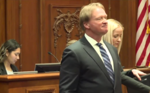 jon gruden stands in court