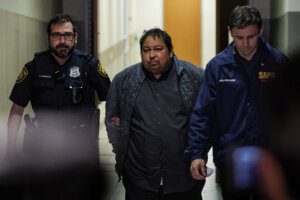 Ramon Preciado is escorted by San Antonio Police