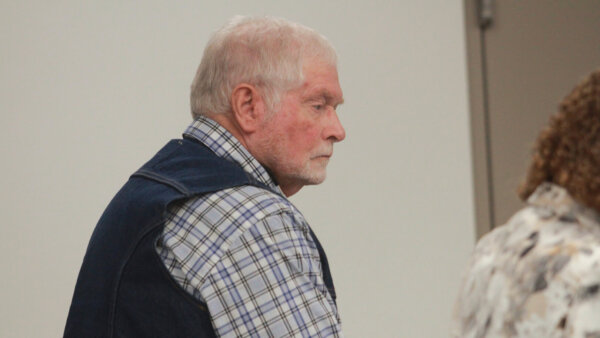 George Alan Kelly listens to closing arguments in court.