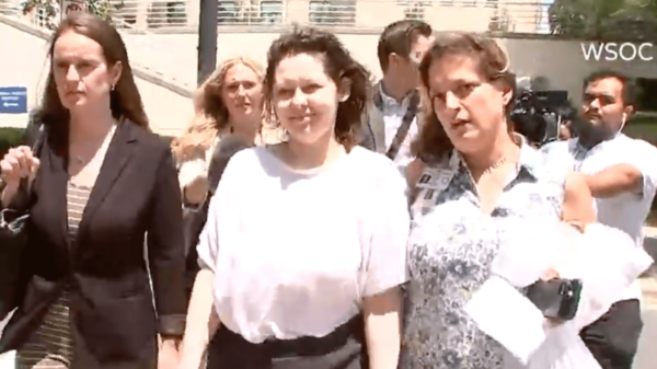 Diana Cojocari, mother of a missing North Carolina girl, Madalina Cojocari, leaves prison. Upon leaving prison she's asked about Madalina's whereabouts by reporters and she replies, "I hope she's safe." Diana waited nearly one month before reporting the child missing.