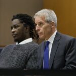 Brian Steel in court next to Young Thug.
