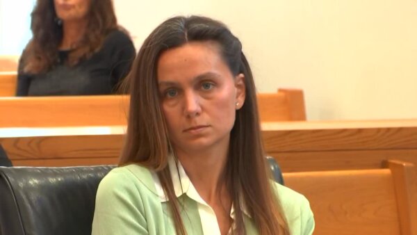 woman looks at camera