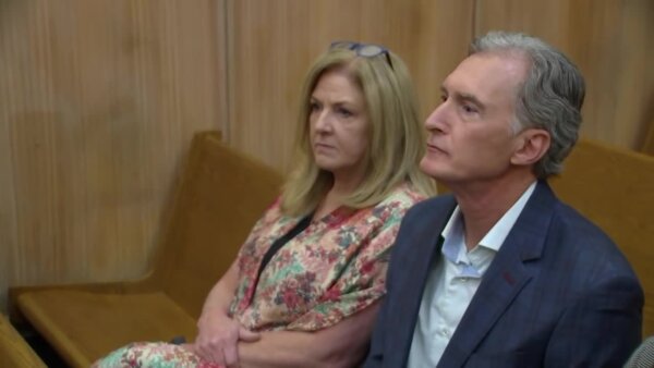 man and woman appear in court