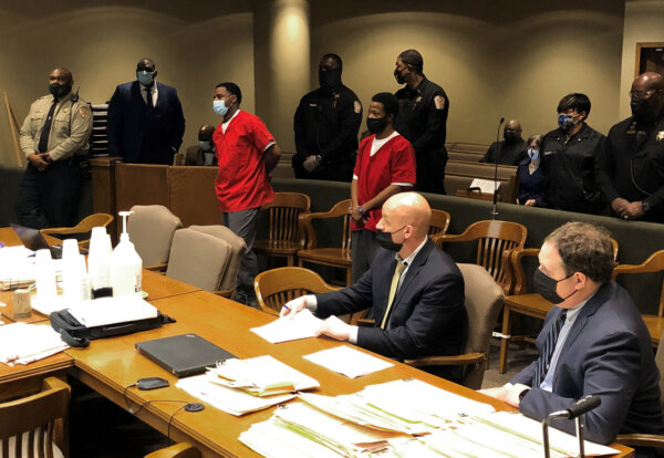 Justin Johnson and Cornelius Smith in courtroom