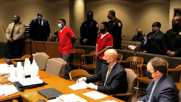 Justin Johnson and Cornelius Smith in courtroom