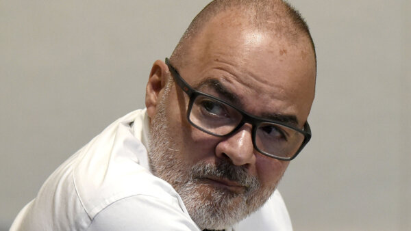 Victor Malavet sits in court