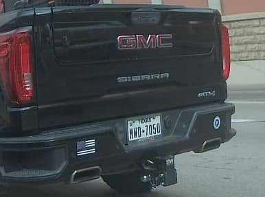 license plate and rear of GMC Sierra truck