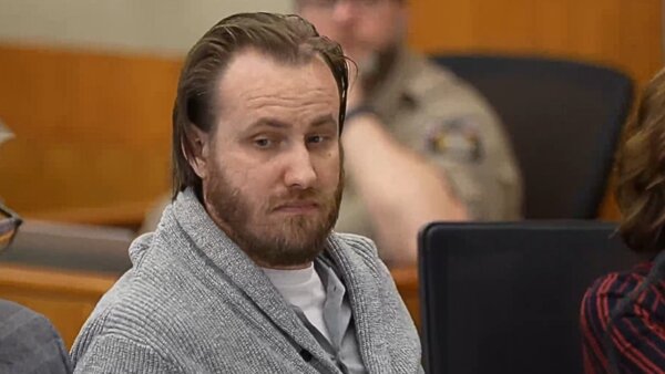 Kevin Ellis sits in court