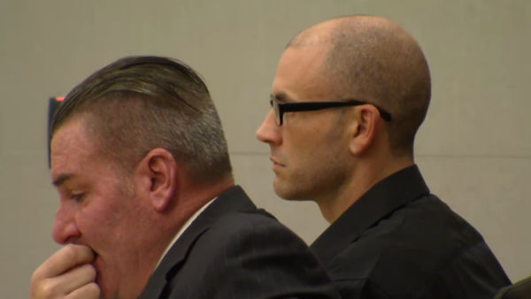 Brandon Janik sits in court