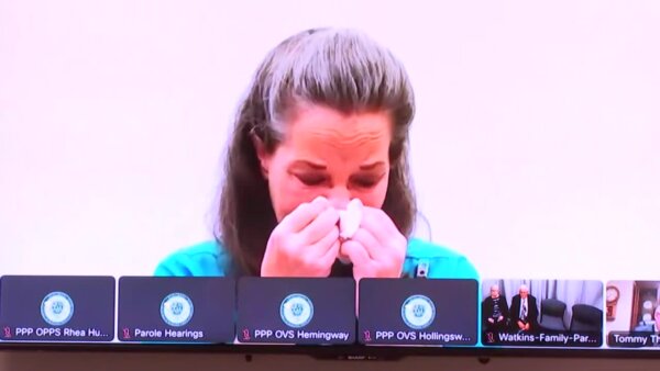 Susan Smith cries into a tissue