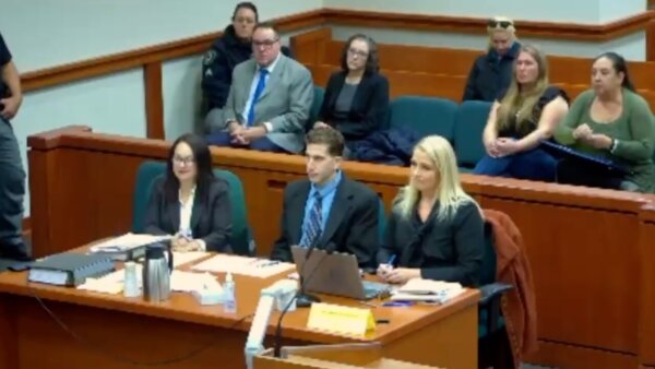 Bryan Kohberger sits with his attorneys in court