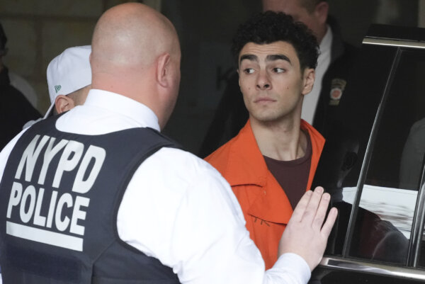 Luigi Mangione arrives at court