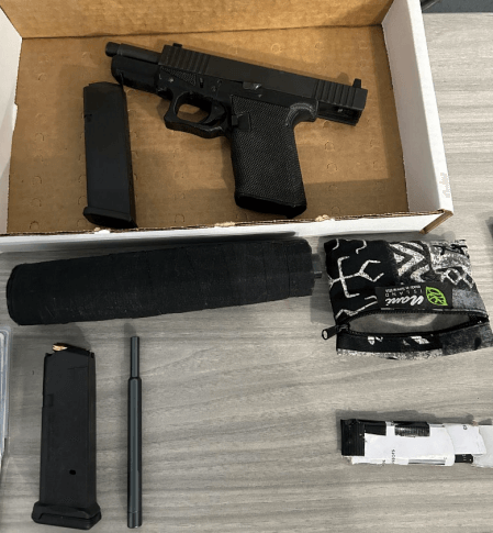 photo of gun and silencer