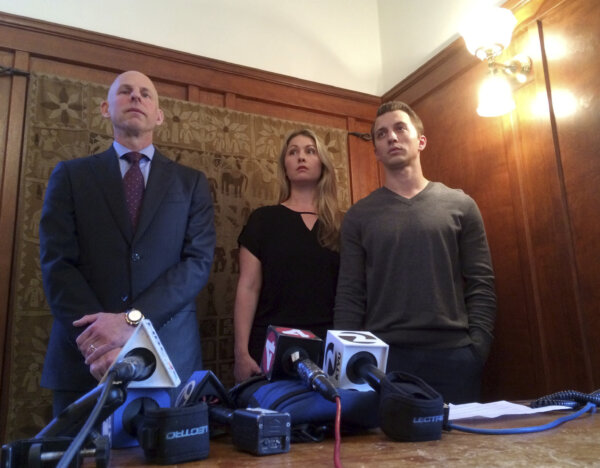 Lawyer Anthony Douglas Rappaport speaks at a news conference with his clients, Denise Huskins and her boyfriend Aaron Quinn