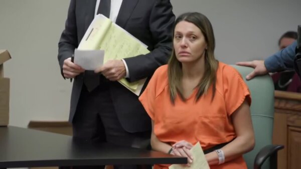 Laura Caron sits in court