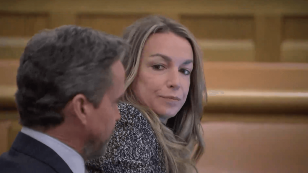 Karen Read sits next to Alan Jackson in court