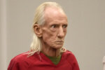 Joseph Czuba, 71, stands before Circuit Judge Dave Carlson for his arraignment at the Will County, Ill., courthouse, Oct. 30, 2023, in Joliet, Ill.