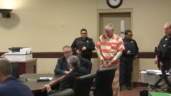 Colin Gray walks into court