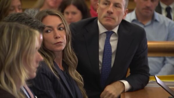 Karen Read sits in court with her attorneys
