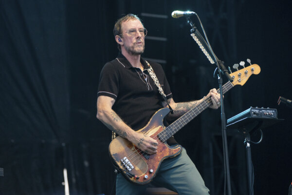 Scott Shriner of Weezer performs