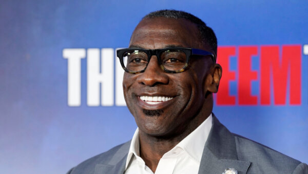 Shannon Sharpe poses