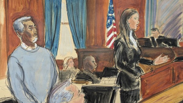 Sean Diddy Combs, left, stands as his defense attorney, Teny Geragos, gives her opening statement