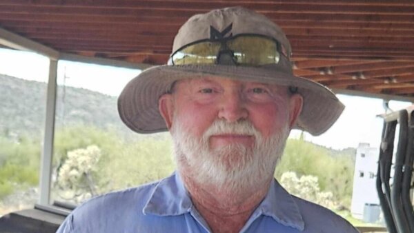 man in fishing hat