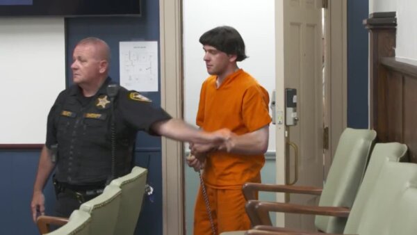 Samuel Hochstetler walks into court