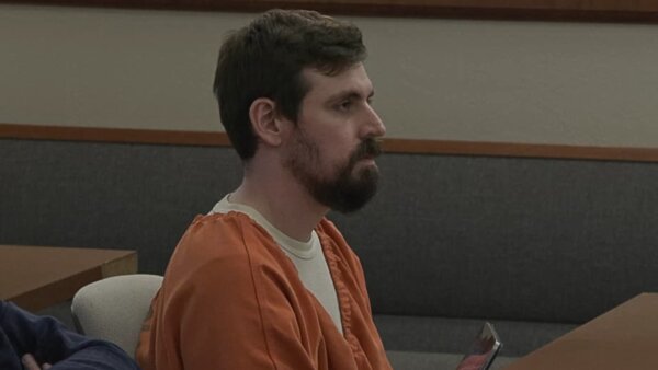 Jordan Henning sits in court