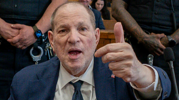 Harvey Weinstein gives thumbs up in court