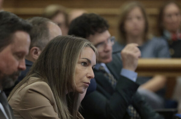 Karen Read listens to the testimony of expert Daniel Wolfe,