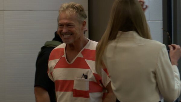 Barry Morphew smiles in court