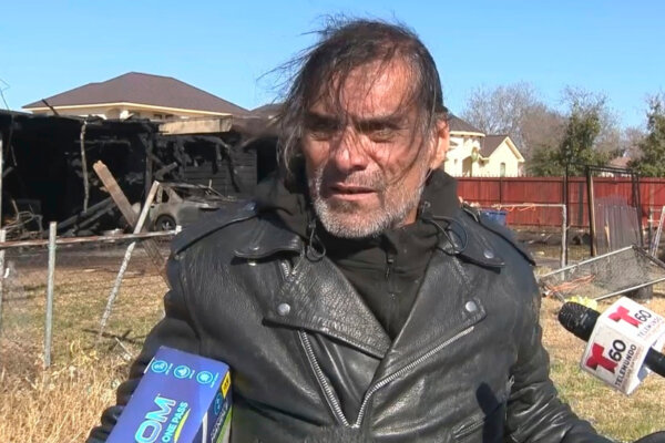 Jonathan Joss talks to reporters following a fire at his San Antonio, Texas, home